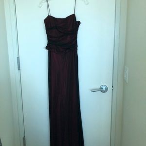 Sheer black over red lining. Gives it an iridescent look. Spaghetti straps..